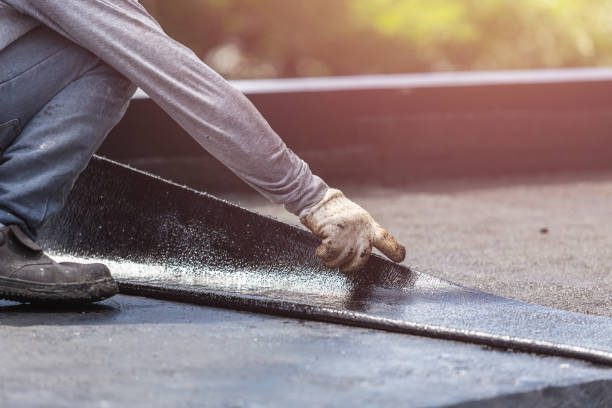 Professional Basement Waterproofing technician working in Cory, IN